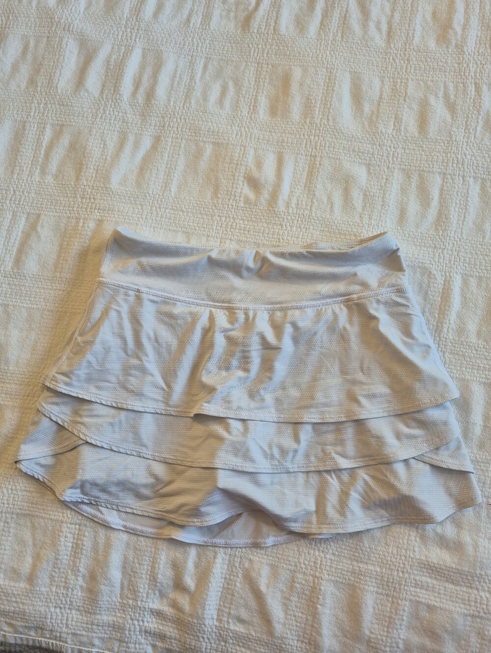 Athleta girls size Large or 12 swing skort light gray, zip back pocket VGUC